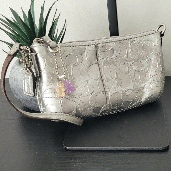 Coach Handbags - Coach Silver Wristlet Bag